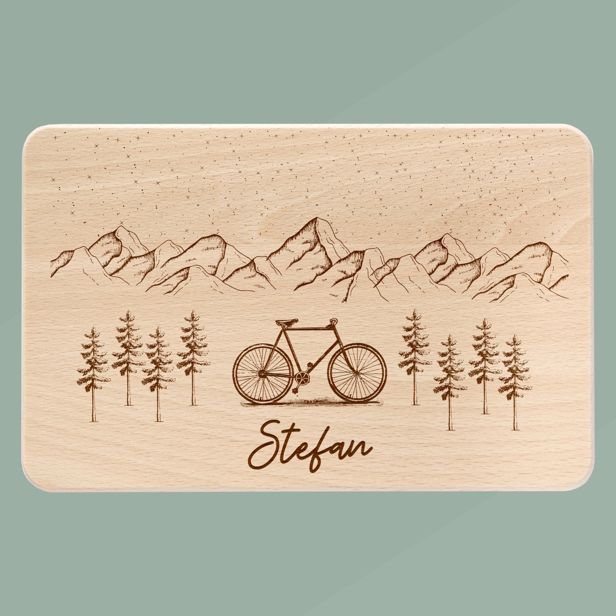 Frühstücksbrett Holz - Fahrrad Berge - Abenteuernah