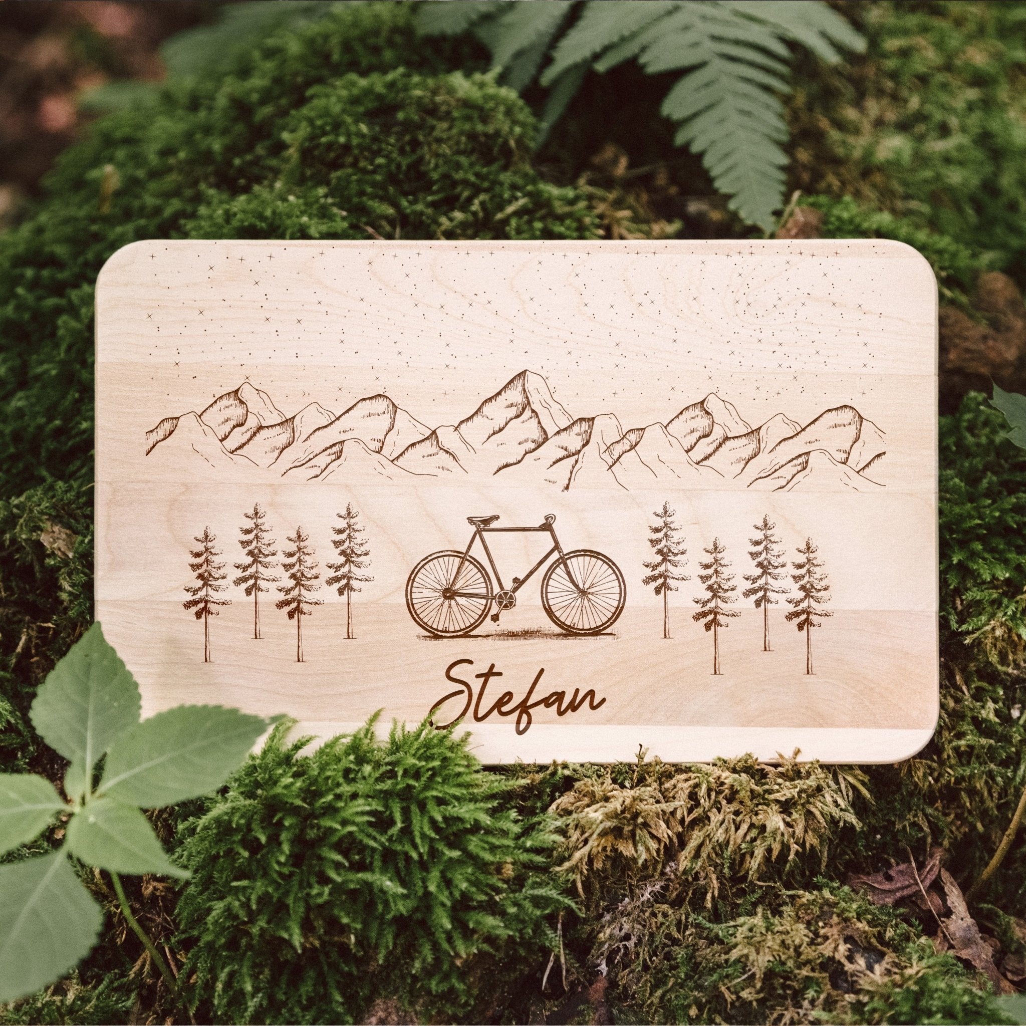 Frühstücksbrett Holz - Fahrrad Berge - Abenteuernah