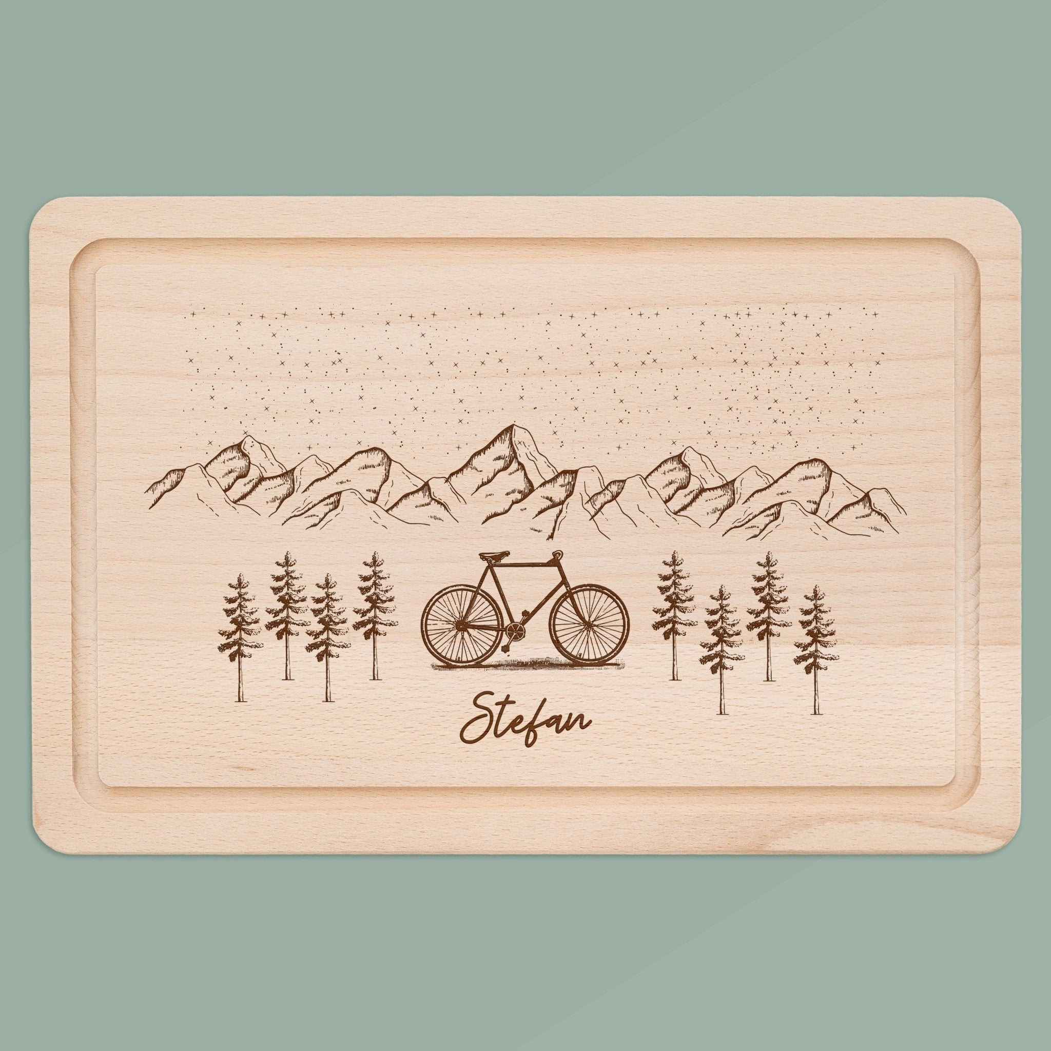 Schneidebrett mit Saftrille - Berge und Fahrrad - Abenteuernah